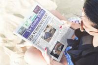 Girl Reading Newspaper Beach Scene Mockup