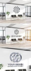 Reflective Metal Logo on Office Wall Mockup 385081333