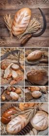 Bread and wheat on wood background stock photo