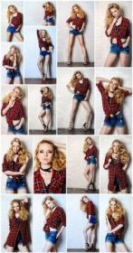 Sexual blonde girl in jeans shorts and checkered shirt alluring by a brick wall - Beauty fashion, 18xUHQ JPEG