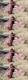 Nudist couple enjoying blowjob at the beach