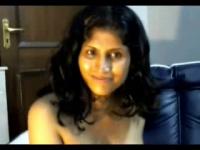 A hot Desi girl stripping in saree on webcam